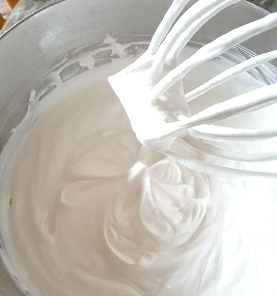 Stiff peak whipped topping in a mixer bowl 