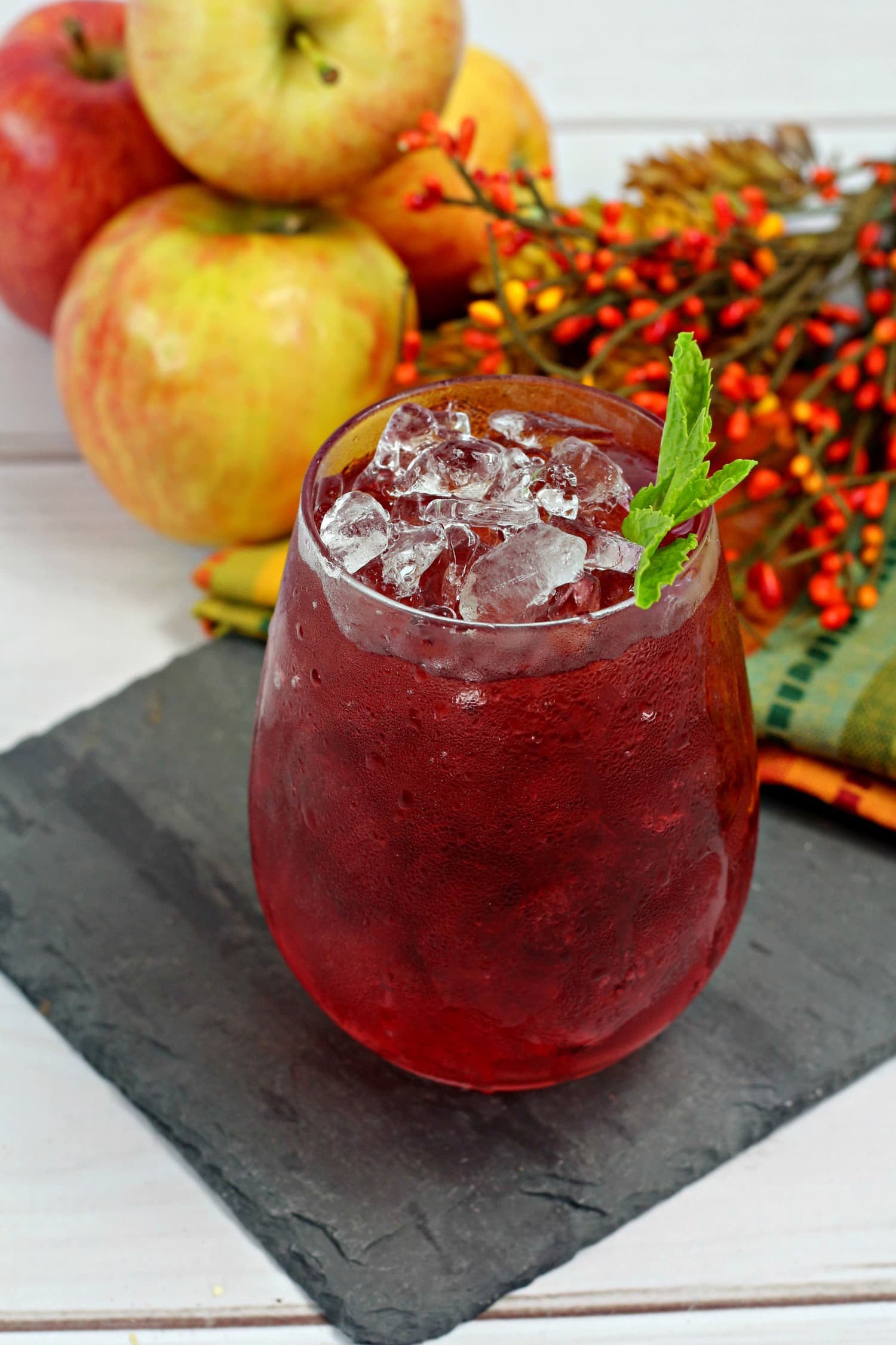 berries and apples make for a delightful rum-based cocktail