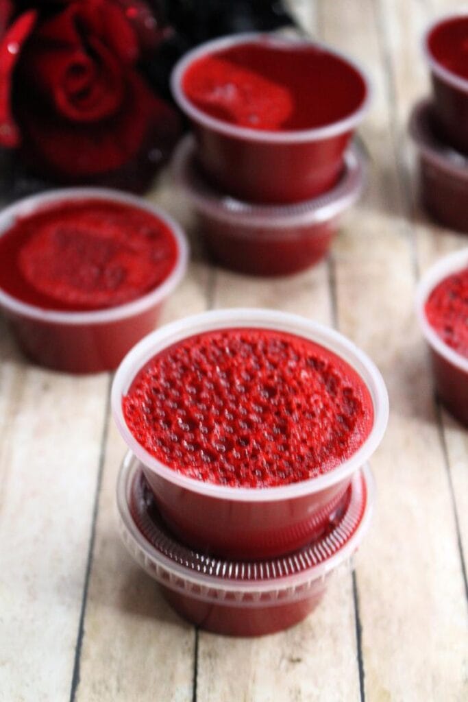 Two jello shots stacked on top of each other. 