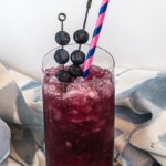 Blueberry Rum Swizzle: Paradise in a Glass | Blueberry cocktail recipes | White rum cocktail recipes | Rum cocktail recipe | Tropical and tart cocktail recipes | cocktails that require to be swizzled #Swizzle #Blueberry #Rum #WhiteRum #BlueberryRum #Cocktail #CocktailRecipe