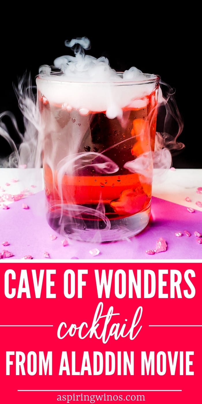 Cave of Wonders Cocktail Recipe with Dry Ice | Inspired by Aladdin, this fun pineapple cocktail has major party wow factor. It includes vodka and cherry liqueur, with dry ice making it a party pleaser, even better for a Halloween night. #cocktail #vacationcocktail #drinkrecipe #pineapplecocktail