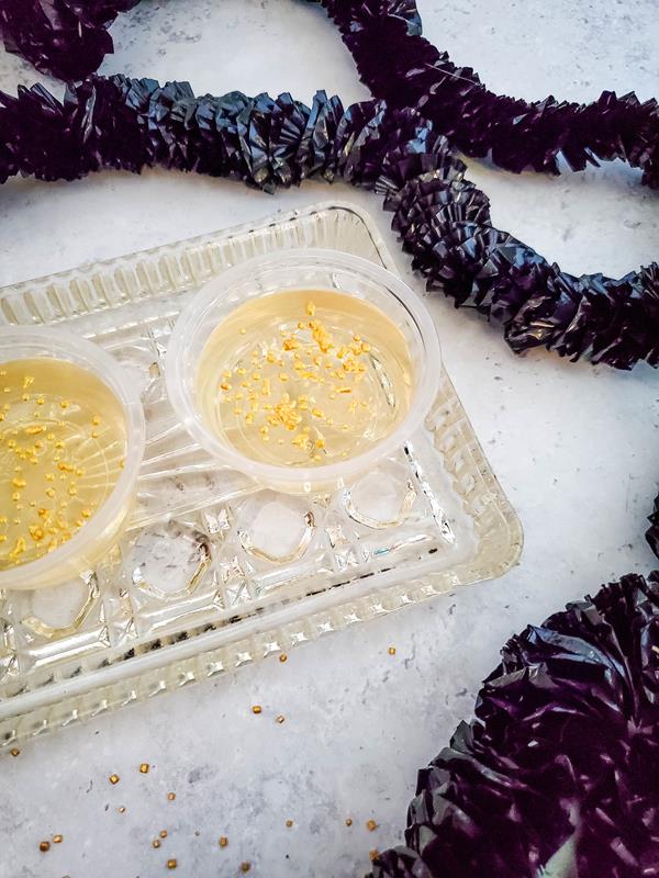 champagne jello shots with new year's eve decorations