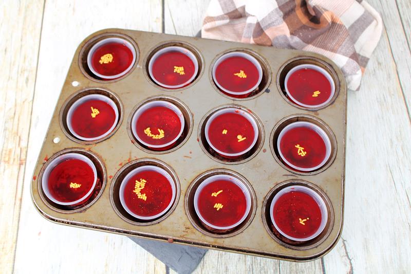 Cherry Bomb Jello Shot Recipe in a baking tray with toppings