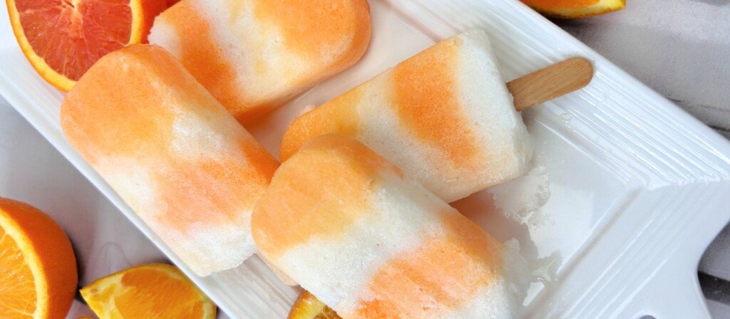 Cool Down This Summer with Boozy Orange Creamsicle Popsicles