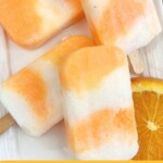 Cool Down This Summer with Boozy Orange Creamsicle Popsicles | Boozy Orange Creamsicle Popsicles | Boozy Popsicles | Summertime Popsicle Recipe | Beat The Heat with Boozy Orange Creamsicle Popsicles #BoozyPopsicles #SummerRecipes #BoozyOrangeCreamsiclePopsicles #OrangeCreamsiclePopsicles #PopsicleRecipes