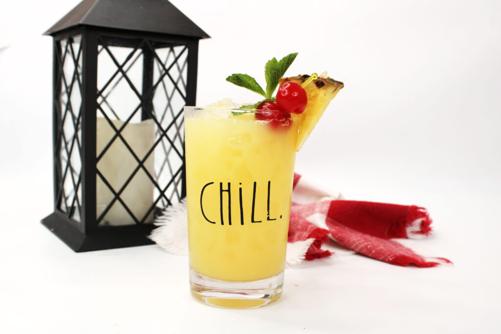 Disney Scream Canister Cocktail & Mocktail recipe in a glass on a table