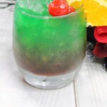 Kaa The Snake Disney Cocktail | Spiced Rum Cocktail | Mango Passion Rum Cocktail | Midori Cocktail | Disney Themed Cocktail Recipe | Jungle Book Cocktail #KaaTheSnake #SpicedRum #MangoPassionRum #Midori #JungleBookCocktail #DisneyInspiredCocktail