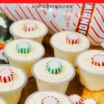 Peppermint Twist Pudding Shots | Get in the Holiday Spirit with Peppermint Twist Pudding Shots | Peppermint Vodka Recipes | Pudding Shot Recipes | Christmas Shot Recipes | Holiday Seasonal Pudding Shots #Peppermint #PuddingShots #ChristmasShots #HolidayShots #PeppermintVodka #VodkaPuddingShots