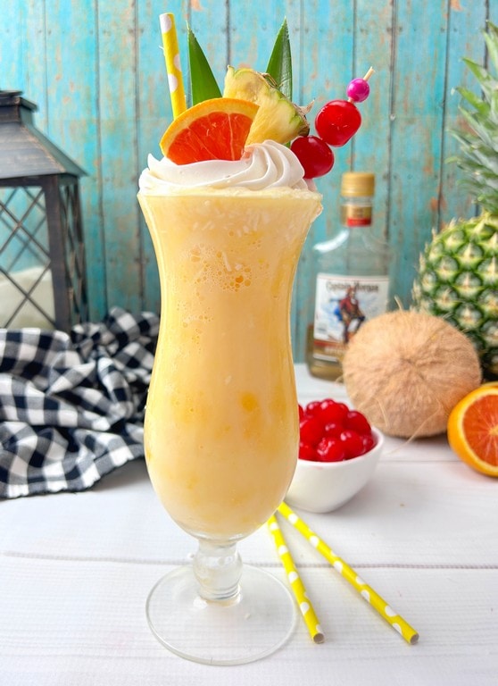 Exotic Twist: Pineapple Orange Pina Colada Recipe - garnished on top. 