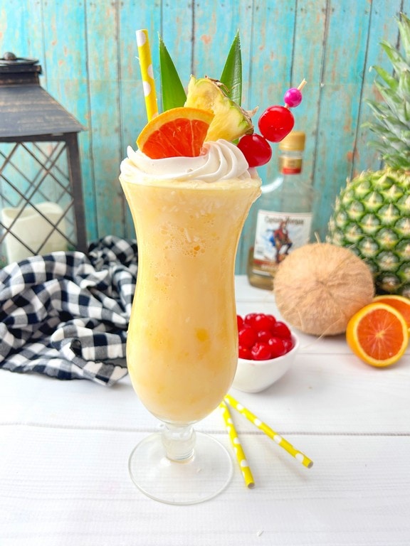 Exotic Twist: Pineapple Orange Pina Colada Recipe - completed cocktail with garnishes 