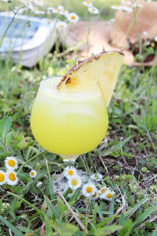 cocktail with large pineapple wedge 