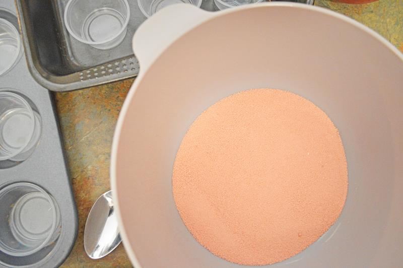 mixing bowl with strawberry jello mix 