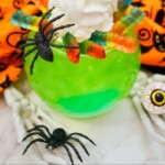Wiggly Worm Halloween Mocktail | Spooky Sips: How to Make a Wiggly Worm Halloween Mocktail | Halloween Mocktail Ideas | Spooky Drink Ideas For Halloween | Gummy Work Drink Ideas | Kid Friendly Halloween Drinks #GummyWorms #Halloween #HalloweenMocktails #WigglyWorms