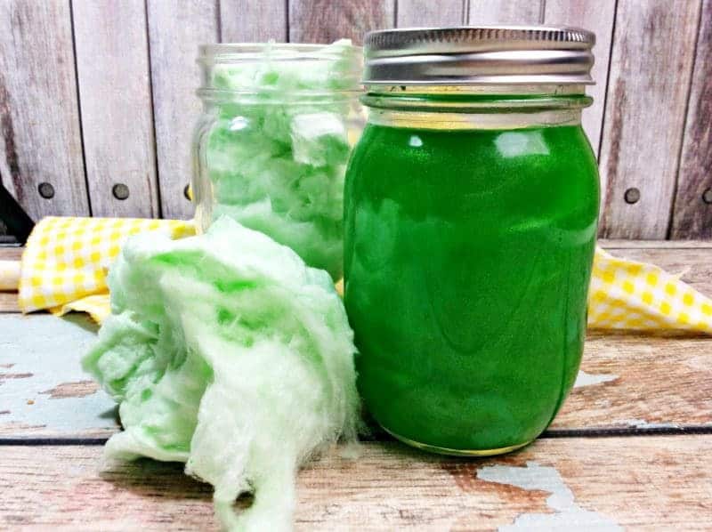 Green Cocktails To Celebrate St. Patrick's Day Without Beer - Green Cotton Candy Moonshine in a Mason Jar