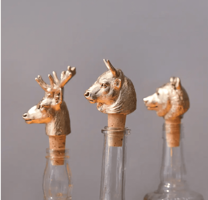 Set of three animal head wine stoppers 