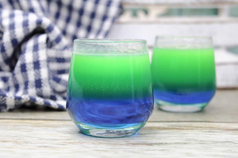 two complated lake days shot glasses with their perfect green and blue layers. 