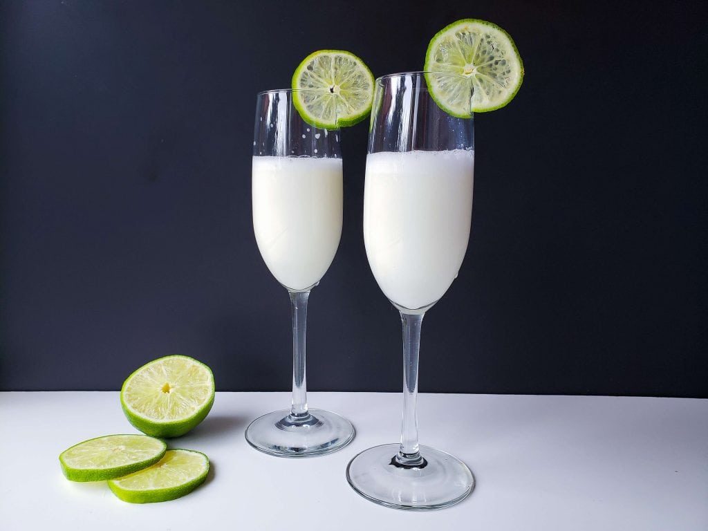 Creamy Margarita Cocktail Recipe - Finished drinks garnished with fresh lime slices