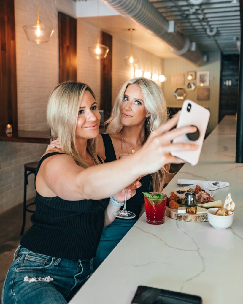 Women taking a selfie together